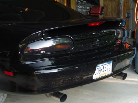 2002 Chevrolet Camaro - Rear view of a black 2002 Chevrolet Camaro with dual exhaust pipes and a Pennsylvania license plate.