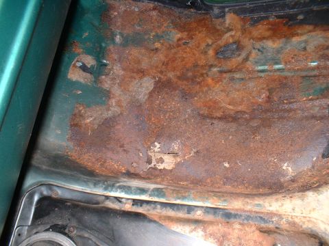 1979 Ford Bronco - Rusted out passenger's side floor.