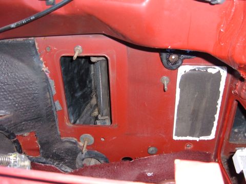 1985 Ford F-150 - Close-up view of the interior firewall of a 1985 Ford F-150, showing two rectangular openings.