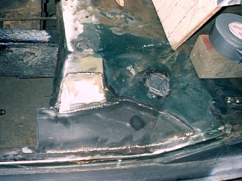 1979 Ford Bronco - Driver's Side - Replacement pieces welded into place. Sheetmetal overlaps original floor area.