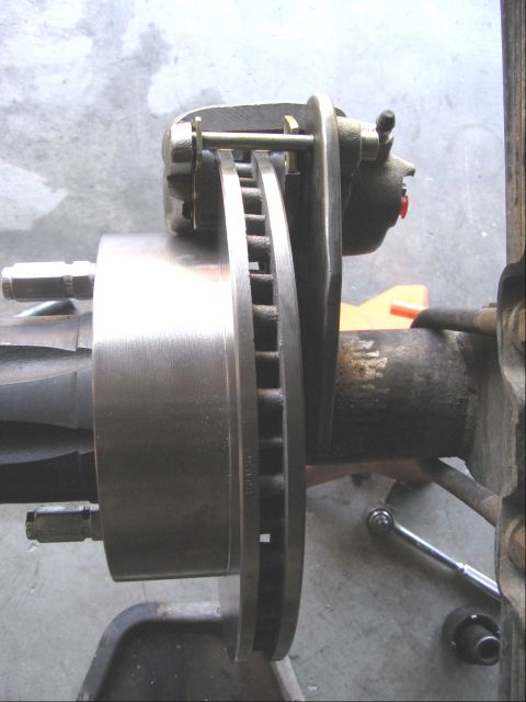1994 Ford Bronco - Disc brake assembly for a 1994 Ford Bronco, focusing on the rotor and caliper components.