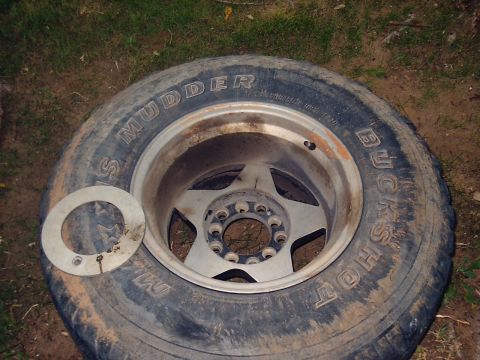 1991 Ford Bronco - Remove front wheel. It's really nasty from working on them crappy auto hubs.