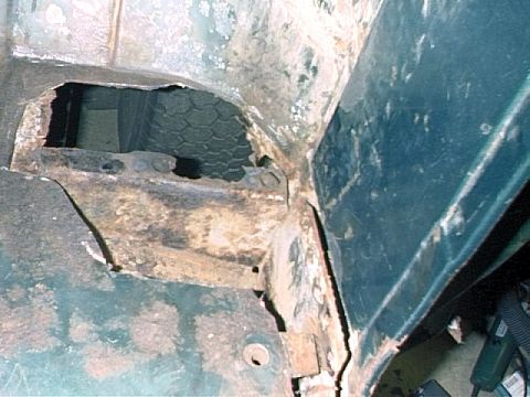 1979 Ford Bronco - Driver's side corner, rusted areas cut out.