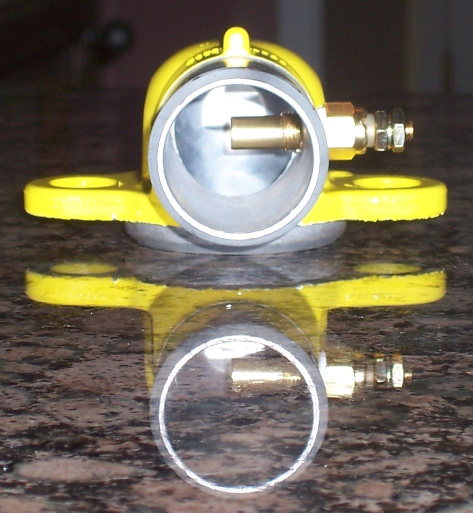 Temp sending unit tapped into thermostat housing. Front view