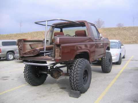 1982 Ford Bronco - Modified 1982 Ford Bronco with custom roll cage and lifted suspension.