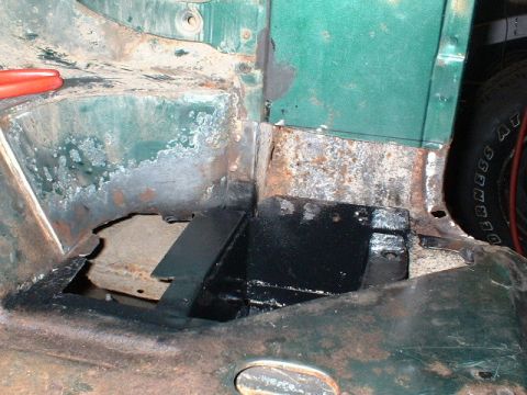 1979 Ford Bronco - Driver's side, rollcage crossmember repaired and painted.