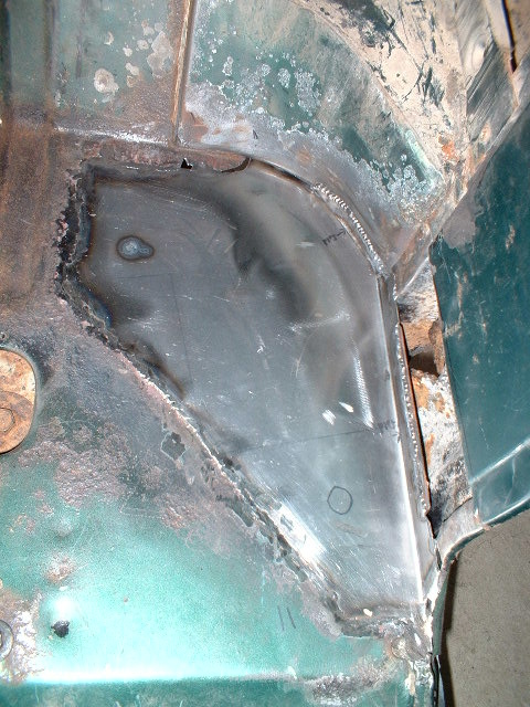 1979 Ford Bronco - Driver's side, patch made over rusted floor area.