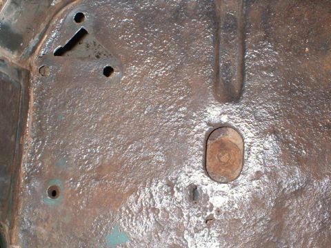 1979 Ford Bronco - Passenger side corner, rusted areas.