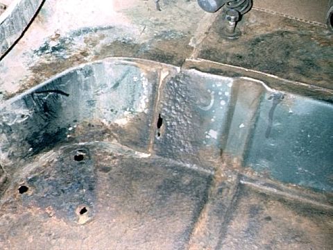 1979 Ford Bronco - Passenger side corner, rusted areas.