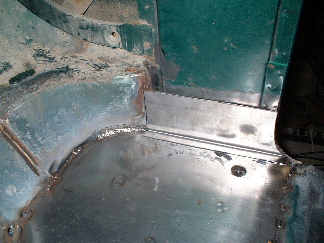 Driver's side B-Pillar - With sheetmetal patch.