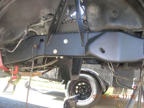 1996 Ford Bronco - Close-up of a modified vehicle frame, showing custom fabrication work.