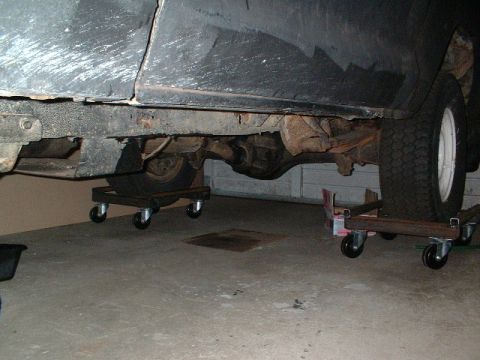 1979 Ford Bronco - Shot of my dollys to move the project truck around in the garage. The casters were expensive (~$15 each), but is silky smooth.