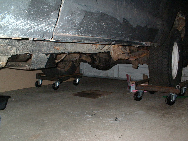 Shot of my dollys to move the project truck around in the garage.  The casters were expensive (~$15 each), but is silky smooth.