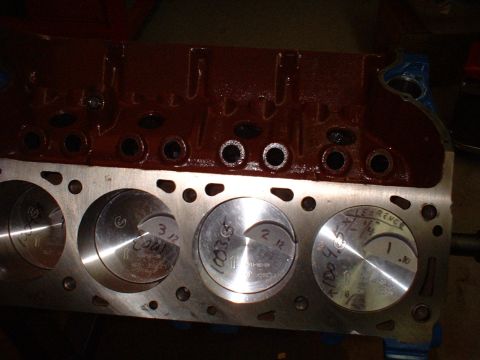 1970 Ford Torino - Engine block with pistons installed, handwritten measurements and clearance notes.
