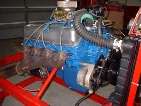 1970 Ford Torino - A blue V8 engine is shown with its chrome air cleaner and exhaust manifold.