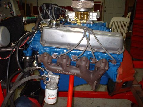 1970 Ford Torino - Engine assembly with visible exhaust manifold and oil filter.