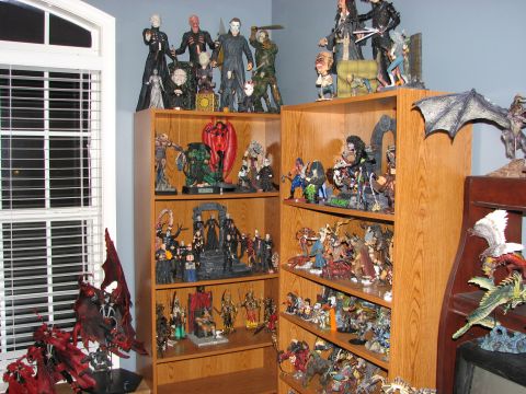 1991 Ford Bronco - A room filled with shelves displaying a large collection of action figures and various collectibles.