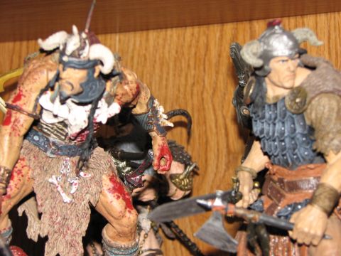 1991 Ford Bronco - These detailed toy figures appear to be part of a collection, possibly from a fantasy or historical theme.