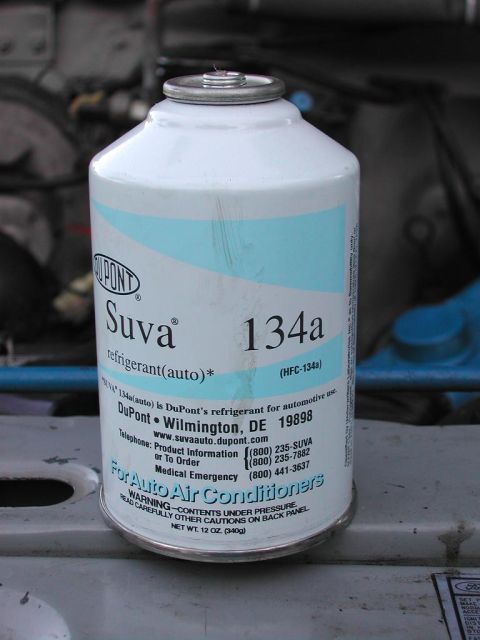 1985 Ford Bronco - I ran the vacuum with both guage set valves open for 30min. Now close both valves and remove the vac pump. Connect a R134a source to the ye…