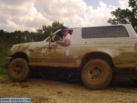 1995 Ford Bronco - Muddy 1995 Ford Bronco on an off-road trip.