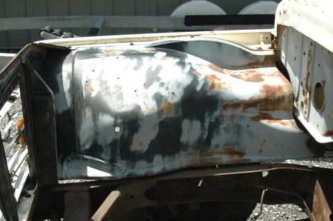 1963 Ford F-250 - The fender well shows signs of rust and previous bodywork, with primer and bare metal visible.