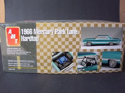 1995 Mercury Sable - Notice how the engine in the picture on the box is different from the actual model. I really like the green on the car on the box.
