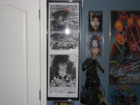1991 Ford Bronco - A collection of framed comic book art and movie memorabilia, including items related to The Crow and a Jason Voorhees figure.