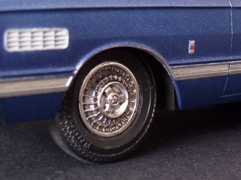 1995 Mercury Sable - Front fender and hubcap. Note the fender badge.