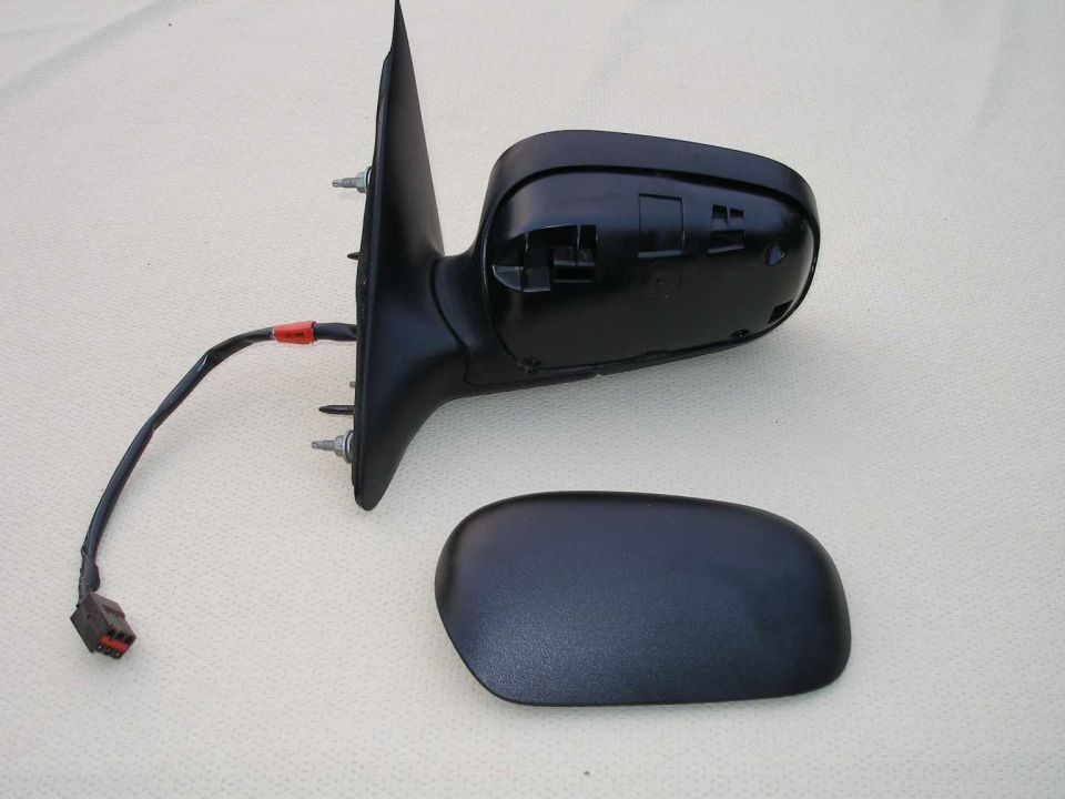 Black power side-view mirror with wiring harness and back cover on white cloth