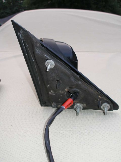 2001 Ford Crown Victoria - The housing is secured by three bolts. The replacement housing has 10mm nuts.