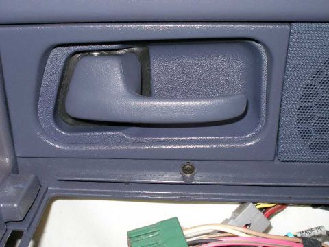2001 Ford Crown Victoria - When removing the door panel, do not forget this screw, that is exposed once you remove the door and window switch panel.