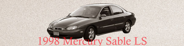 Dark sedan, 1998 Mercury Sable LS, viewed from a 3/4 front angle