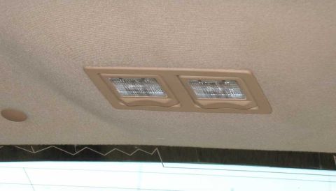 1998 Ford Crown Victoria - Interior overhead light fixture with two rectangular lamps.