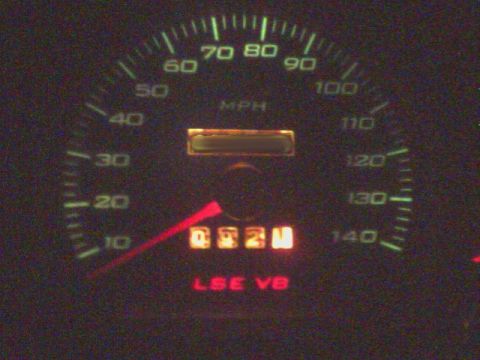 1996 Mercury Grand Marquis - The speedometer displays MPH up to 140, with a digital odometer showing 052M and LSE VB illuminated below.