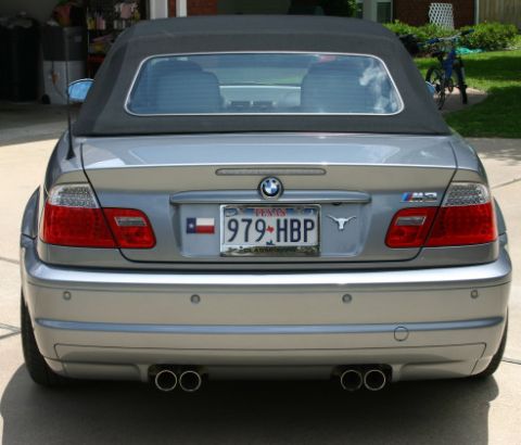 1988 Ford Crown Victoria LTD - Rear view of a silver convertible, identified by the M3 badge and Texas license plate.