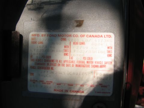 1986 Ford C-350 (Centurion Conversions) - Vehicle identification sticker shows manufacturing date of 02/86 and VIN.