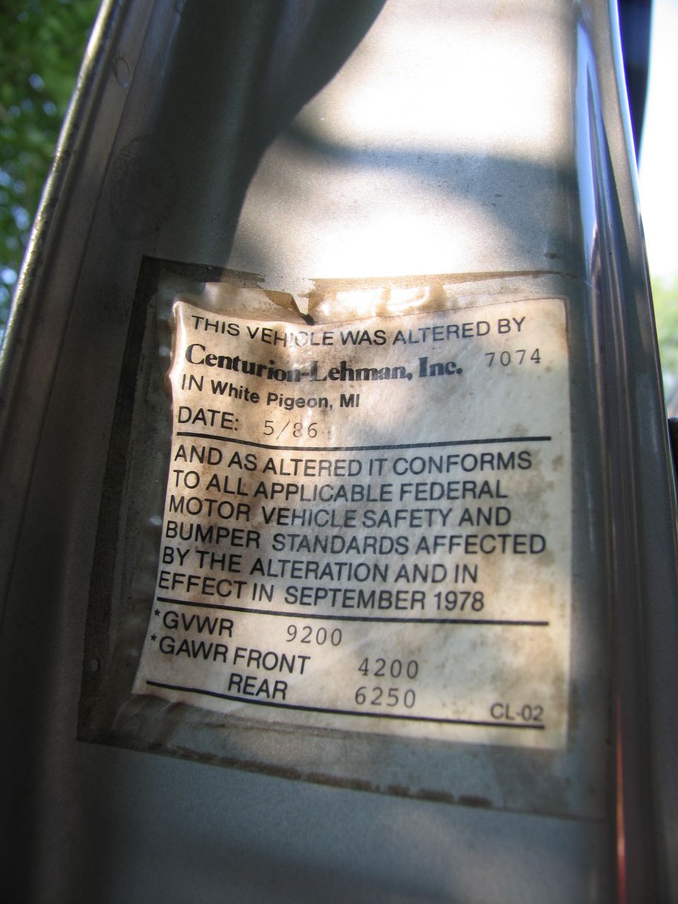 Centurion-Lehman 5/86 vehicle alterer label on a door jamb listing GVWR 9200 and axle ratings