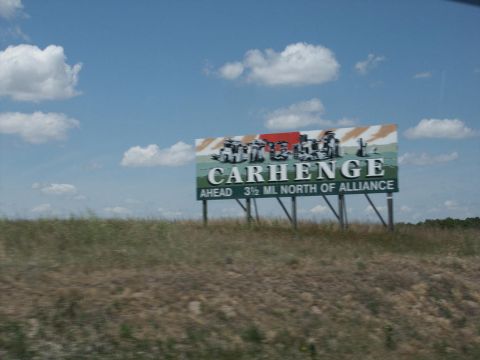 2001 Mercury Grand Marquis - A billboard announces Carhenge is ahead, located 3 1/2 miles north of Alliance.