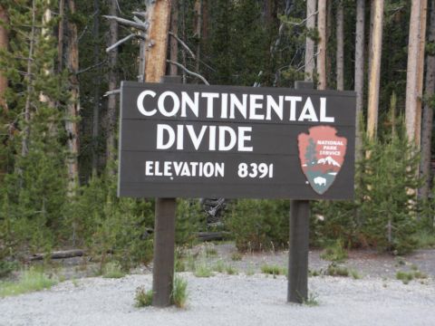 2001 Mercury Grand Marquis - A sign marks the Continental Divide at an elevation of 8391 feet in a wooded area.