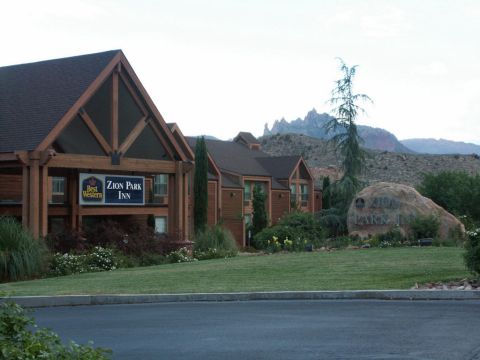 2001 Mercury Grand Marquis - The Best Western Zion Park Inn is pictured with a scenic mountain backdrop.
