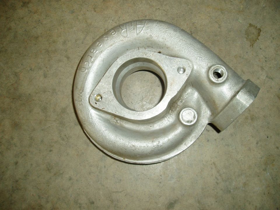 Aluminum turbocharger housing with "A.R. Research" cast into it