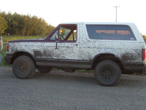 1990 Ford Bronco - This 1990 Ford Bronco is covered in mud after off-roading.