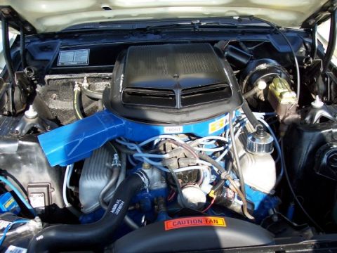 1972 Ford Ranchero - Engine bay detail with prominent blue intake and black air cleaner scoop.