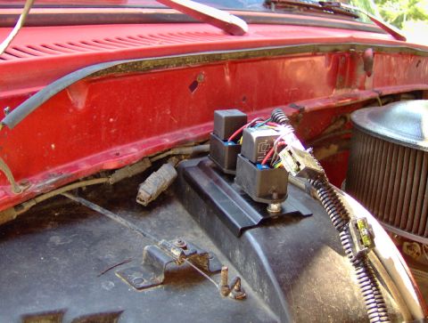 1978 Ford Bronco - Close-up of electrical components and wiring in a vehicle's engine bay.