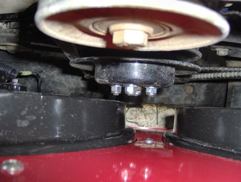 1978 Ford Bronco - Close-up view of dual electric fans installed onto a vehicle's pulley system.