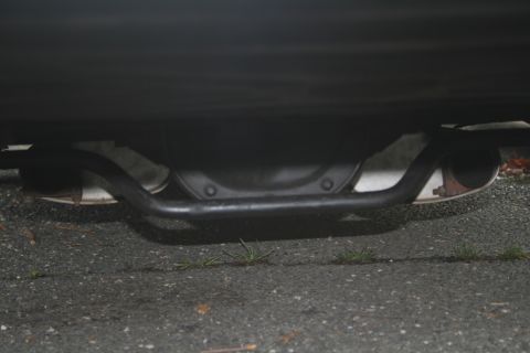 1989 Ford Crown Victoria LTD - The rear differential and exhaust system are visible from underneath the vehicle.