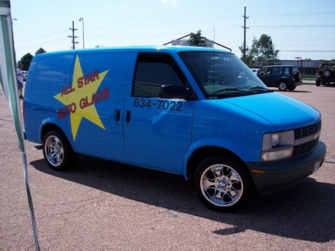 1972 Ford Ranchero - A blue commercial van with "All Star Auto Glass" branding is parked outdoors on a sunny day.