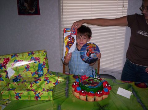 1986 Ford Bronco - A young boy celebrates his birthday with Spiderman-themed decorations and gifts.