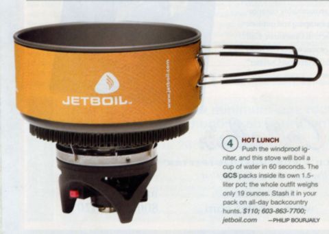 1986 Ford Bronco - Jetboil camping stove is shown with its pot and burner assembly.