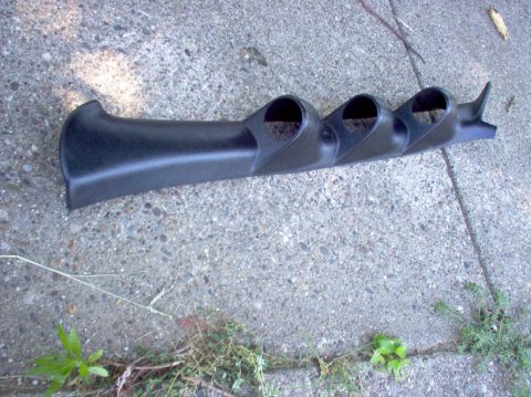 1994 Ford Probe - A black plastic triple gauge pod is shown, designed for interior vehicle mounting.